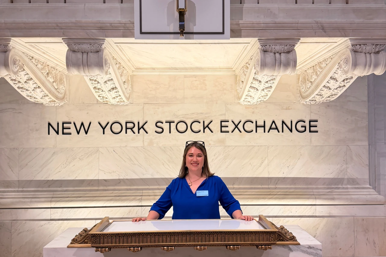 Angela Johnson at the NYSE bell-ringing ceremony on Wall Street